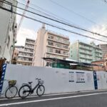 町屋駅のすぐ近くに地上13階建ての共同住宅が建設